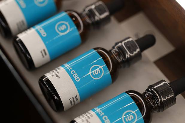 Products with CBD oil are displayed during the grand opening of a MedMen marijuana dispensary, 823 S. 3rd St., in downtown Las Vegas Wednesday, July 18, 2018.