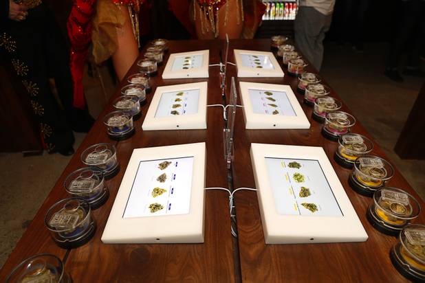 Marijuana samples are displayed with touch-screen tablets during the grand opening of a MedMen marijuana dispensary, 823 S. 3rd St., in downtown Las Vegas Wednesday, July 18, 2018.