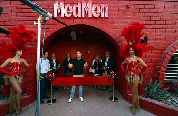 Adam Bierman, center, MedMen co-founder and CEO, speaks during the grand opening of a MedMen marijuana dispensary, 823 S. 3rd St., in downtown Las Vegas Wednesday, July 18, 2018.