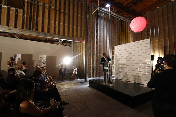 An "Air Orb" flies behind Bob Groesbeck, Planet 13 co-CEO,  during a news conference for the Planet 13 Superstore dispensary, a cannabis entertainment complex, under construction on Desert Inn Road near The Strip Thursday, July 19, 2018. Six German-made, illuminated Air Orbs will be fly in a show over the dispensary floor, a representative said.