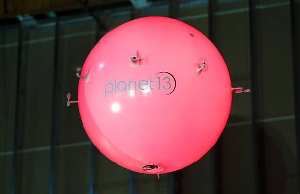 An "Air Orb" flies during a news conference for the Planet 13 Superstore dispensary, a cannabis entertainment complex, under construction on Desert Inn Road near The Strip Thursday, July 19, 2018. Six German-made, illuminated Air Orbs will be fly in a show over the dispensary floor, a representative said.