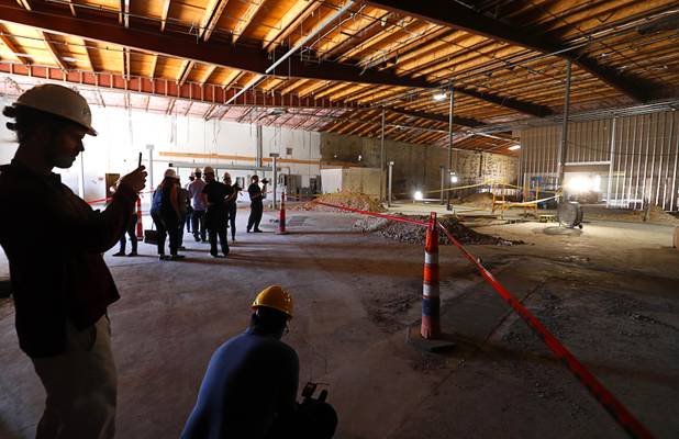 Journalists and guests get a view of what will become the dispensary floor during a news conference for the Planet 13 Superstore dispensary, a cannabis entertainment complex, under construction on Desert Inn Road near The Strip Thursday, July 19, 2018. Phase 1, expected to be complete in November 2018, will include an interactive entertainment space and more than 16,500 sq. ft. of retail space.