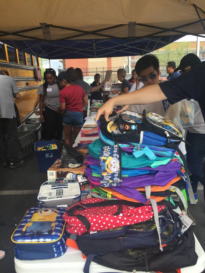 Stacks of donated backpacks sit on a table during Comunities in Schools of Southern Nevada’s Fill the Bus donation drive in 2017. This year’s drive, which benefits more than 50,000 students in the Clark County School District, takes place Friday at two Las Vegas Valley locations.