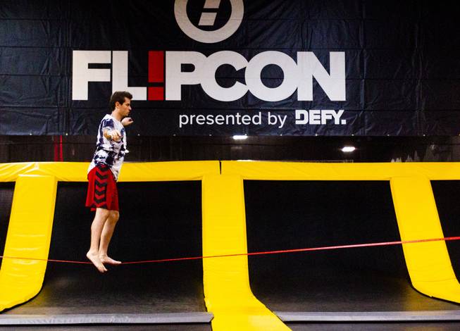 Influencer Jordan Bell (instagram @jaybells) from North Carolina tries out the tight rope during the second annual FlipCon event sponsored by Circus Trix at their park Gravady in Las Vegas, Monday, 23, 2018. FlipCon invites influencers from all over the U.S. to participate in SuperTramp activities to produce content for their fan base and to network with fellow influencers.