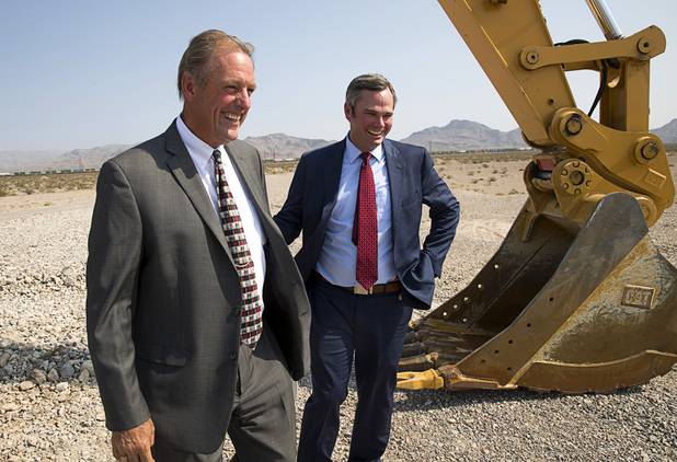 North Las Vegas Mayor John Lee and North Las Vegas City Manager Ryann Juden smile at the conclusion of a water pipeline groundbreaking ceremony near Speedway Boulevard and Centennial Parkway in North Las Vegas Tuesday, July 31, 2018. The pipeline, expected to be completed in late 2020, will jumpstart development in the Apex Industrial Park, officials said.