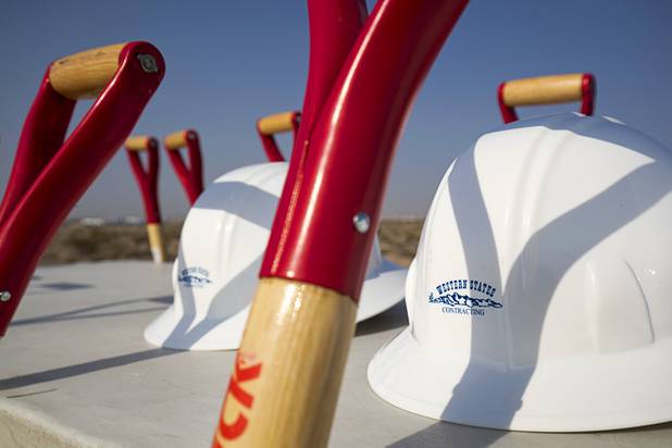 Hardhats and shovels are positioned on a table before a water pipeline groundbreaking ceremony near Speedway Boulevard and Centennial Parkway in North Las Vegas Tuesday, July 31, 2018. The pipeline, expected to be completed in late 2020, will jumpstart development in the Apex Industrial Park, officials said.