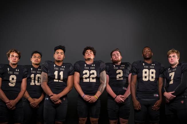 Members of the Faith Lutheran High football team pose for a photo at the Las Vegas Sun's high school football media day Tuesday July 31, 2018 at the Red Rock Resort and Casino. They include, from left, Keagan Touchstone, Taimani McKenzie, Ma'a Gaoteote, Hunter Kaupiko, Nate Meredith, David "DJ" Heckard and Sagan Gronauer.