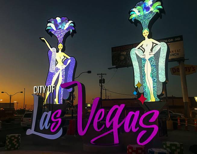 The likenesses of showgirls are seen the evening before their debut at Las Vegas Boulevard and Main Street as part of the city’s new gateway, Monday, Aug. 6, 2018.