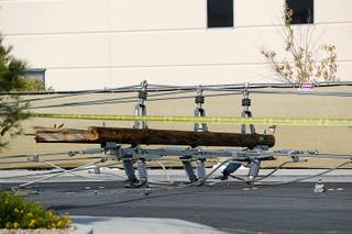 The top of a power pole is shown on Polaris Avenue after forklift operator accidentally brought down 15 power poles Friday, Aug. 10, 2018. No one was injured but the accident cut off electricity to hundreds of NV Energy customers, officials said.