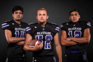 Members of the Silverado High football team pose for a photo at the Las Vegas Sun's high school football media day Tuesday July 31, 2018 at the Red Rock Resort and Casino. They include, from left, Kana Hoapili, Andrew Woods and Jacob Mendez.
