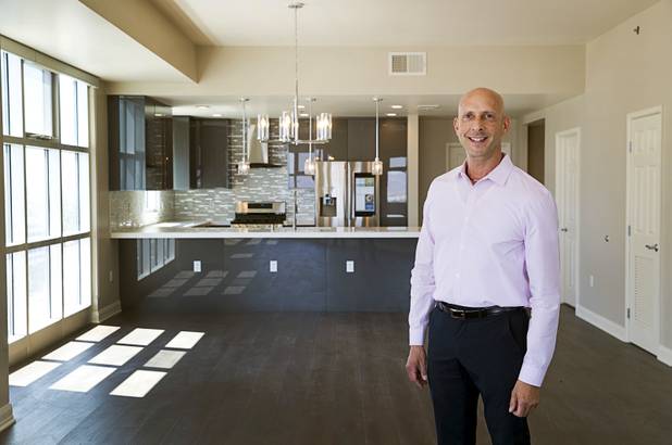 Uri Vaknin, a partner in KRE Capital, poses in a remodeled condo at the Ogden in downtown Las Vegas Tuesday, Aug. 21, 2018.