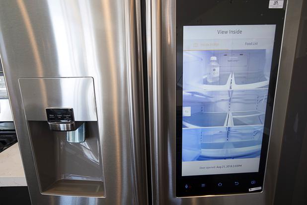 A Samsung refrigerator in a remodeled Ogden condo allows the viewing of the refrigerator contents without opening the door Tuesday, Aug. 21, 2018.