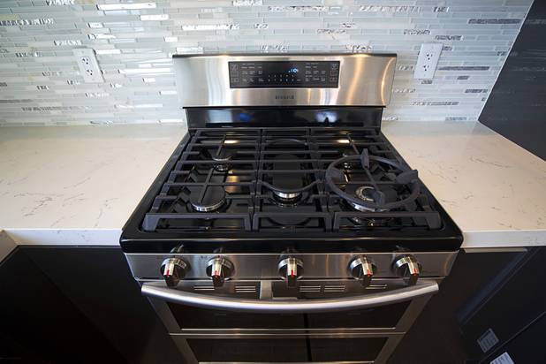 A Samsung oven and range is shown in the kitchen of a remodeled condo on the 17th floor of the Ogden in downtown Las Vegas Tuesday, Aug. 21, 2018.