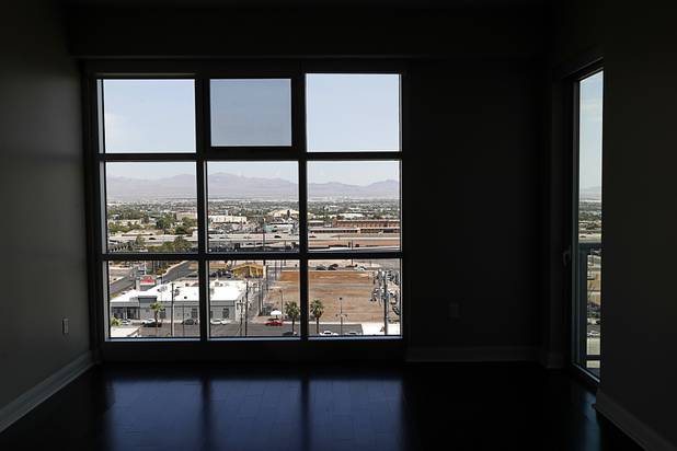 Downtown Las Vegas is viewed from an 11th floor, two-bedroom condo in the Ogden Thursday, Aug. 16, 2018.