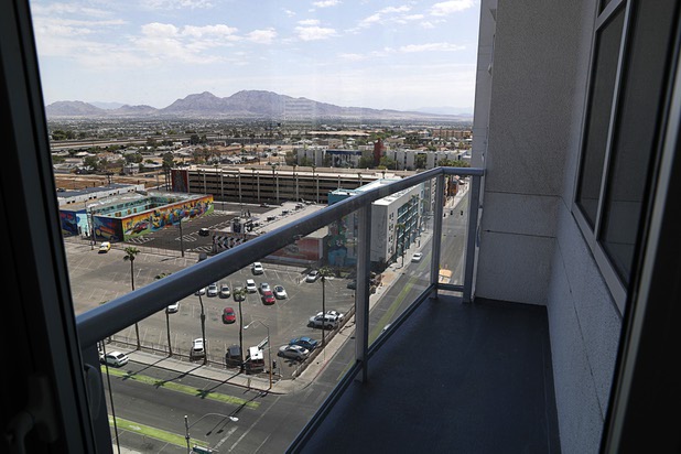 Downtown Las Vegas is viewed from the balcony of an 11th floor, two-bedroom condo in the Ogden Thursday, Aug. 16, 2018.
