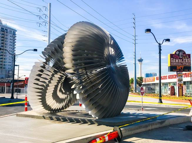 A steel sculpture titled, “Radial Symmetry” was installed this week on a median at Main and Commerce streets to mark the end of the newly finished one-way street concept. The $246,000, 16-foot-by-16-foot steel sculpture was created by local artist Luis Varela-Rico. A public dedication ceremony will Sept. 6.
