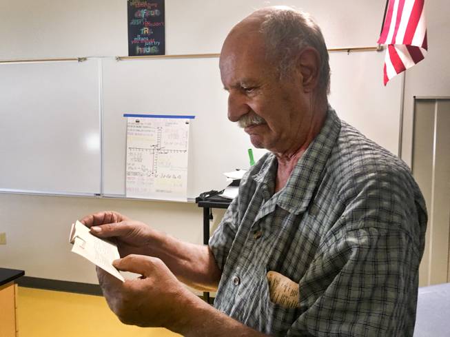 Clark County School District math teacher John Perri, 71, explains how he teaches math using puzzles in his classroom at Southwest Career and Technical Academy, Friday, August 10, 2018. He is celebrating his 50th year of teaching at CCSD.