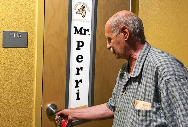 John Perri enters his classroom at Southwest Career and Technical Academy, Friday, Aug. 10, 2018. He is celebrating his 50th year of teaching at CCSD.