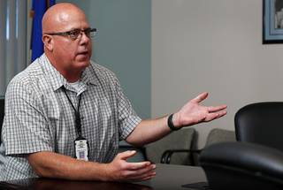 Metro Police Sgt. Robert Stauffer, a traffic fatality investigator, responds to a question during an interview at Metro Police Traffic Bureau Tuesday, Aug. 7, 2018.