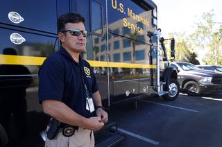 Gary Schofield, U.S. Marshal for the District of Nevada, poses outside a mobile command center during Operation STAR in Las Vegas Thursday, Sept. 6, 2018. The three-week operation led by the U.S. Marshals Service in Nevada led to the arrests of 135 suspects wanted in felonies, the agency said.