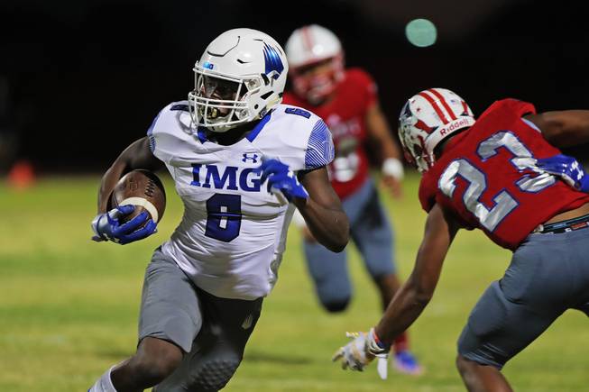 IMG Academy running back Trey Sanders (6) runs the ball during a game against Liberty at Liberty High School, Friday, Sep. 7, 2018.