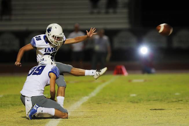 IMG Academy player Cameron Gillis (38) kicks for a field goal during a game against Liberty at Liberty High School, Friday, Sep. 7, 2018.