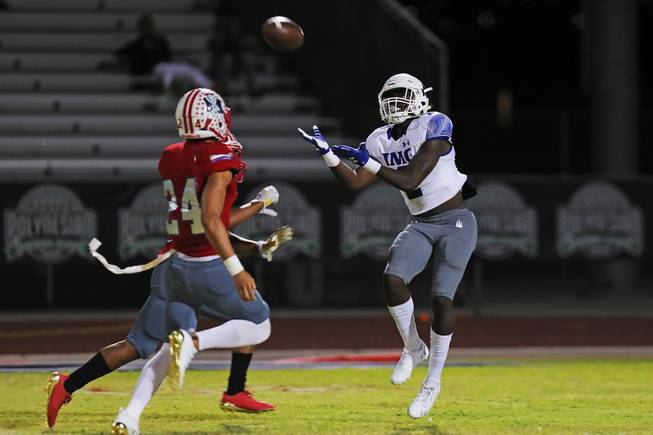 IMG Academy wide receiver Shamar Nash (2) completes a pass during a game against Liberty at Liberty High School, Friday, Sep. 7, 2018.