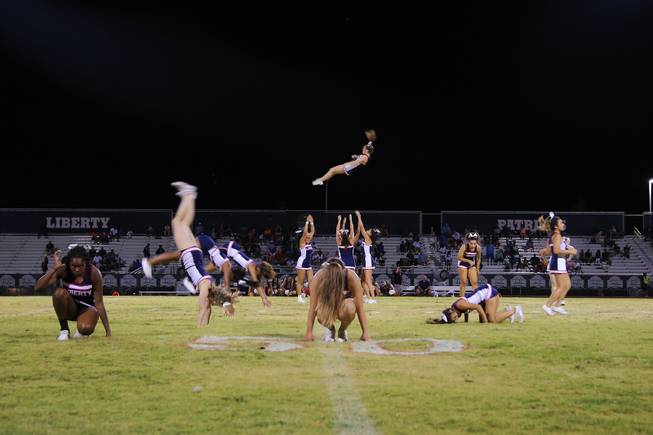 Liberty cheerleaders perform during a game against IMG Academy at Liberty High School, Friday, Sep. 7, 2018.