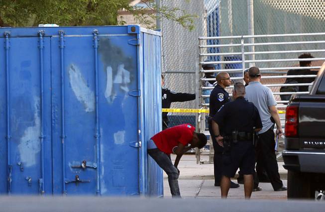 North Las Vegas Police investigate a fatal shooting near a ball field at Canyon Springs High School in North Las Vegas Tuesday, Sept. 11, 2018. 