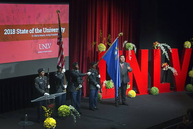 Perry Chacar, a School of Music doctoral student, performs the national anthem  the annual State of the University address at UNLV Thursday, Sept. 13, 2018. A combined Air Force and Army ROTC honor guard presents the colors at left.