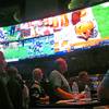 In this Sept. 9, 2018, photo, customers watch an NFL game in the sports betting lounge at the Ocean Resort Casino in Atlantic City, N.J.