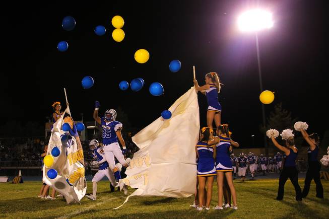 Moapa Valley players return to the field after half time to play Cheyenne at Moapa Valley High School, Friday, Sep. 14, 2018.
