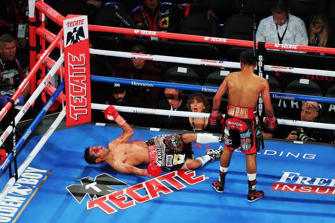 Roman Gonzalez of Nicaragua knocks out Moises Fuentes of Mexico during their super flyweight bout at T-Mobile Arena Saturday, Sept. 15, 2018.
