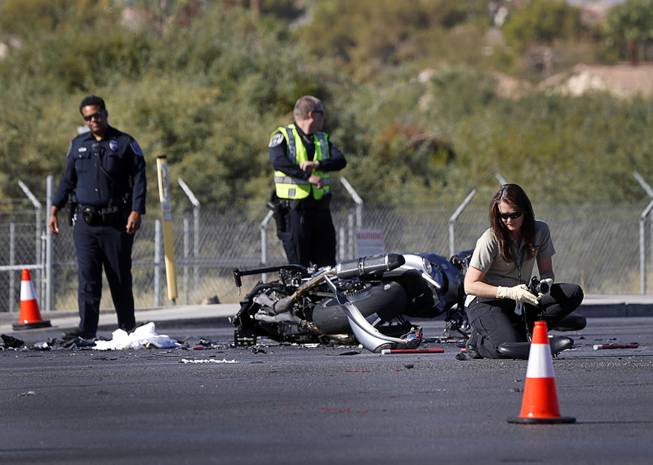 North Las Vegas Police investigate a fatal accident between a motorcyclist and a pickup truck at the intersection of Craig Road and North 5th Street in North Las Vegas Wednesday, Sept. 19, 2018. 