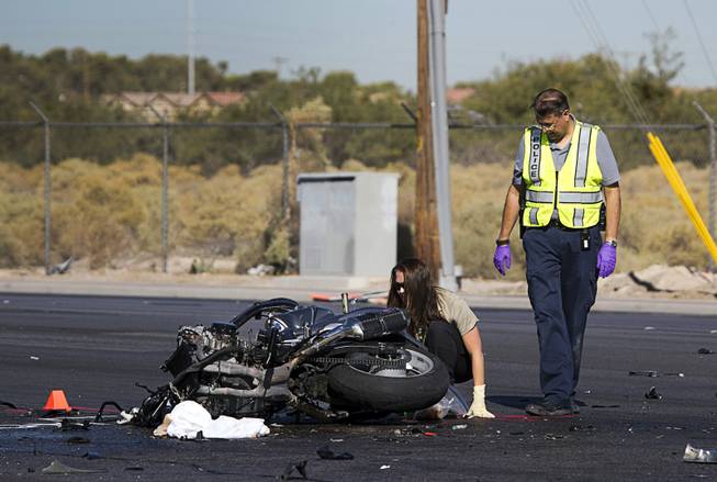 North Las Vegas Police investigate a fatal accident between a motorcyclist and a pickup truck at the intersection of Craig Road and North 5th Street in North Las Vegas Wednesday, Sept. 19, 2018.