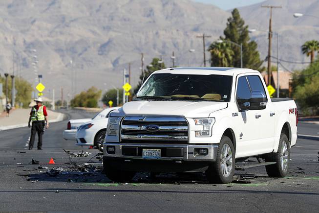 North Las Vegas Police investigate a fatal accident between a motorcyclist and a pickup truck at the intersection of Craig Road and North 5th Street in North Las Vegas Wednesday, Sept. 19, 2018.