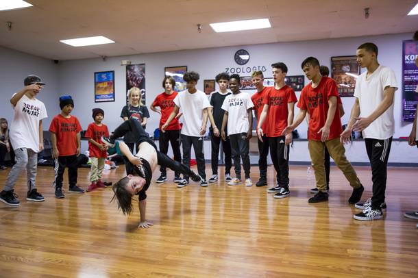Students learn breaking dancing during a training camp at Zoologic, Wednesday, Sept. 12, 2018.