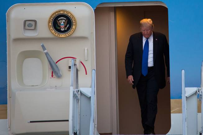 President Trump arrives at McCarran International Airport Thursday Sept. 20, 2018, to speak at a MAGA rally at the Las Vegas Convention Center.