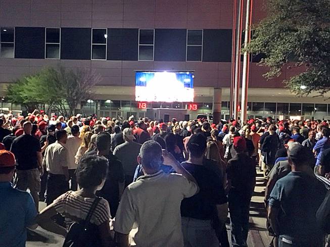 An overflow crowd is seen outside the Las Vegas Convention Center, which hosted a rally with President Donald Trump Thursday, Sept. 20, 2018.