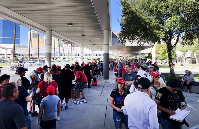 President Trump supporters arrive early at the Las Vegas Convention Center ahead of a rally to drum up support for the Republican party on Sept. 20, 2018.