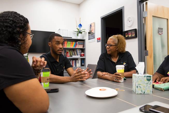 From left, Masumi Hicks, Caleb Green and Intersection director Harriet Barlow, have a discussion at the resource center inside the UNLV Student Union,  Friday Sept. 21, 2018.