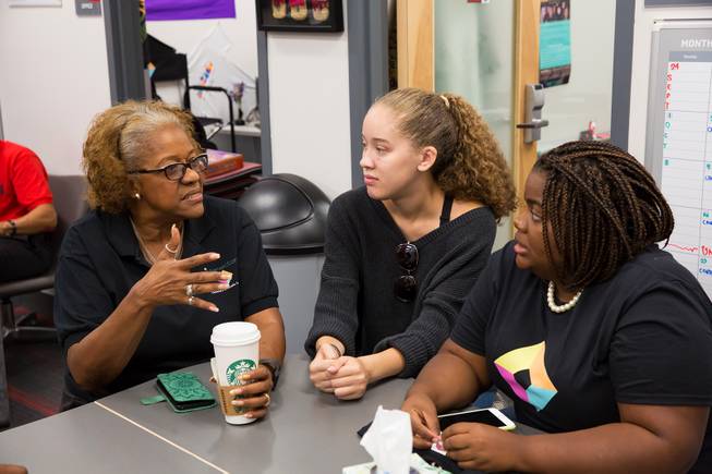 Harriet Barlow, UNLV's Intersection director, has a discussion with sutednts Kiara Sims and Charmaine Wilcox at the organization's resource center Friday Sept 21, 2018.