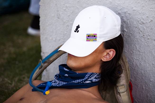 A festivalgoer naps during the first day of the Life is Beautiful music festival in downtown Las Vegas, Friday, Sept. 21, 2018.