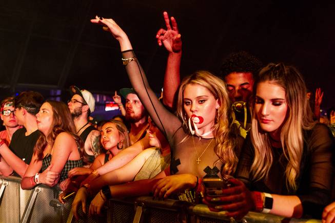 Fans look on during Flight Facilities performance during the second day of the Life is Beautiful music festival in downtown Las Vegas, Saturday, Sept. 22, 2018.