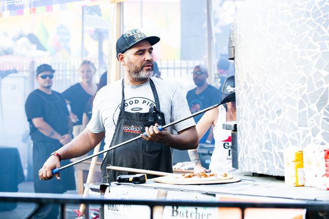 Chef Vincent Rotolo of the Good Pie restaurant cooks oven fire pizzas during the second day of the Life is Beautiful music festival in downtown Las Vegas, Saturday, Sept. 22, 2018.