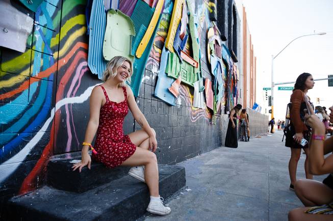 A festivalgoer poses for a photo during day three of the Life is Beautiful music festival in downtown Las Vegas, Sunday, Sept. 23, 2018.