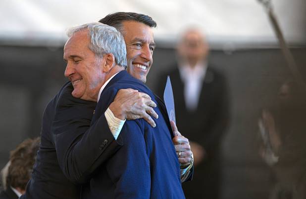 Governor Brian Sandoval gives a hug to Larry Ruvo, vice president and general manager of Southern Wine and Spirits of Nevada, during a groundbreaking ceremony for the MSG Sphere at the Venetian by Koval Lane and Sands Avenue Thursday, Sept. 27, 2018. Ruvo is also the founder of the Keep Memory Alive foundation.