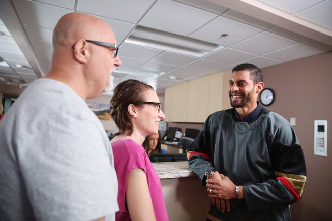 Vegas Golden Knights player Pierre-Édouard Bellemare meets with patients at Comprehensive Cancer Center's Henderson clinic.