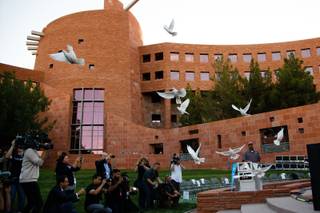 58 Doves are released during a sunrise rememberance ceremony for the victims of the October 1 shooting massacre at the Clark County Government Center, Monday, Oct. 1, 2018.