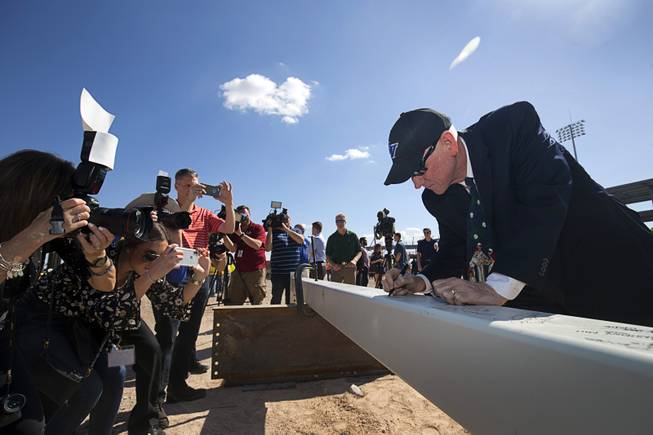 Clark County Commissioner (and former baseball player) Larry Brown signs a steel beam during a topping out ceremony at the Las Vegas Ballpark in Summerlin Thursday, Oct. 11, 2018. The stadium is scheduled to be completed before the team's season opener on April 9, 2019.